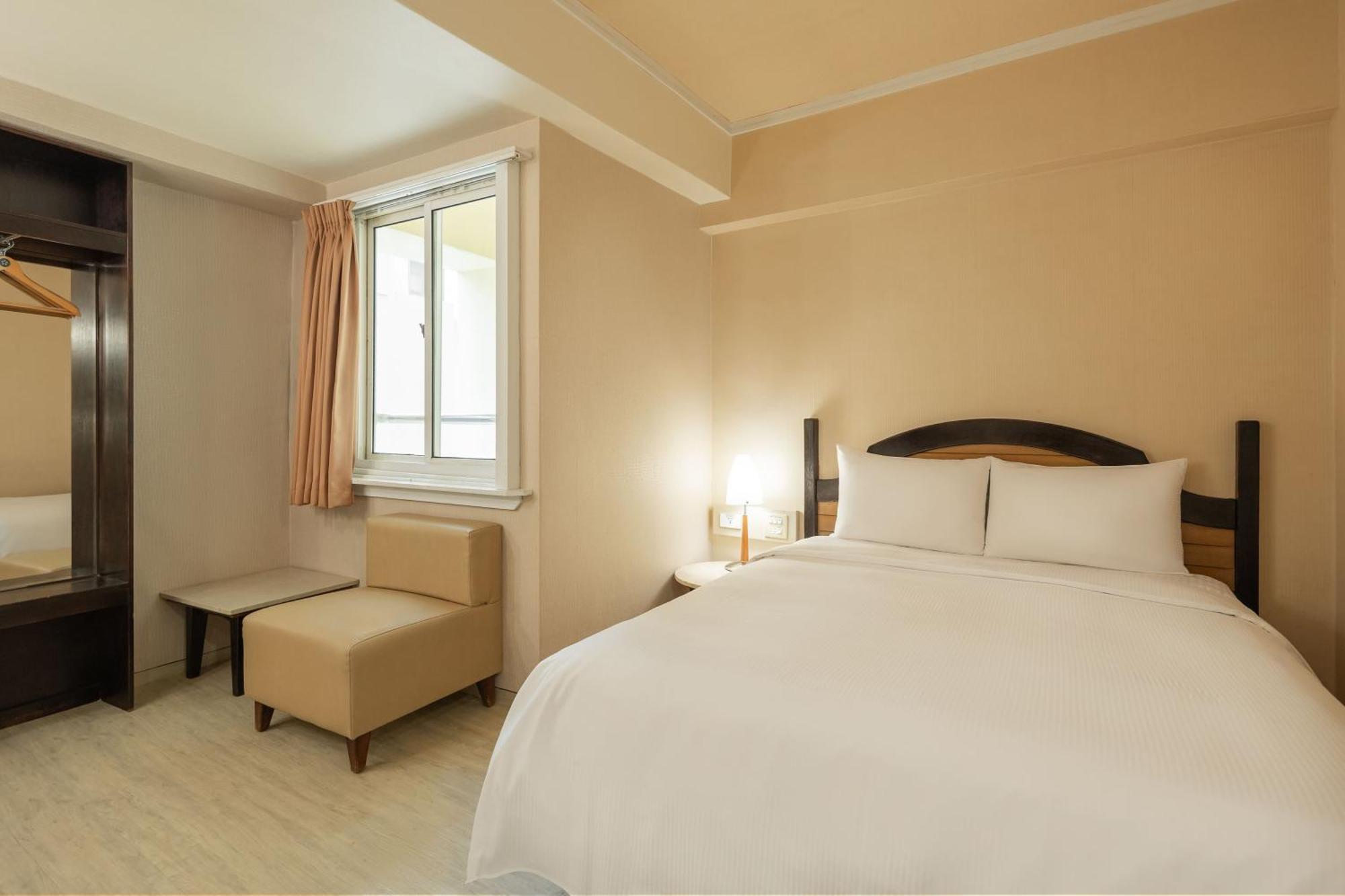 Kindness Hotel Weiwuying Kaohsiung Habitación foto