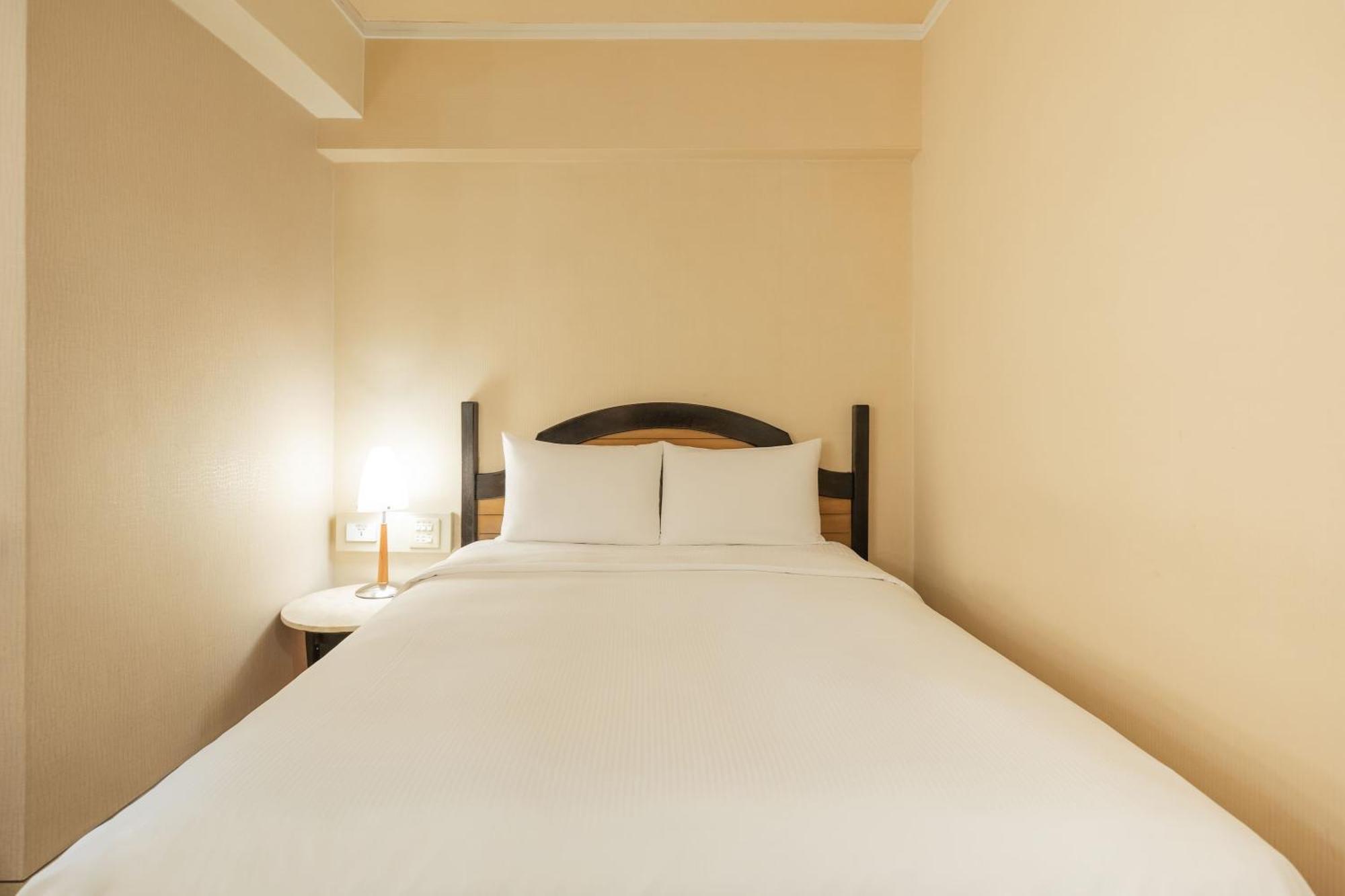 Kindness Hotel Weiwuying Kaohsiung Habitación foto