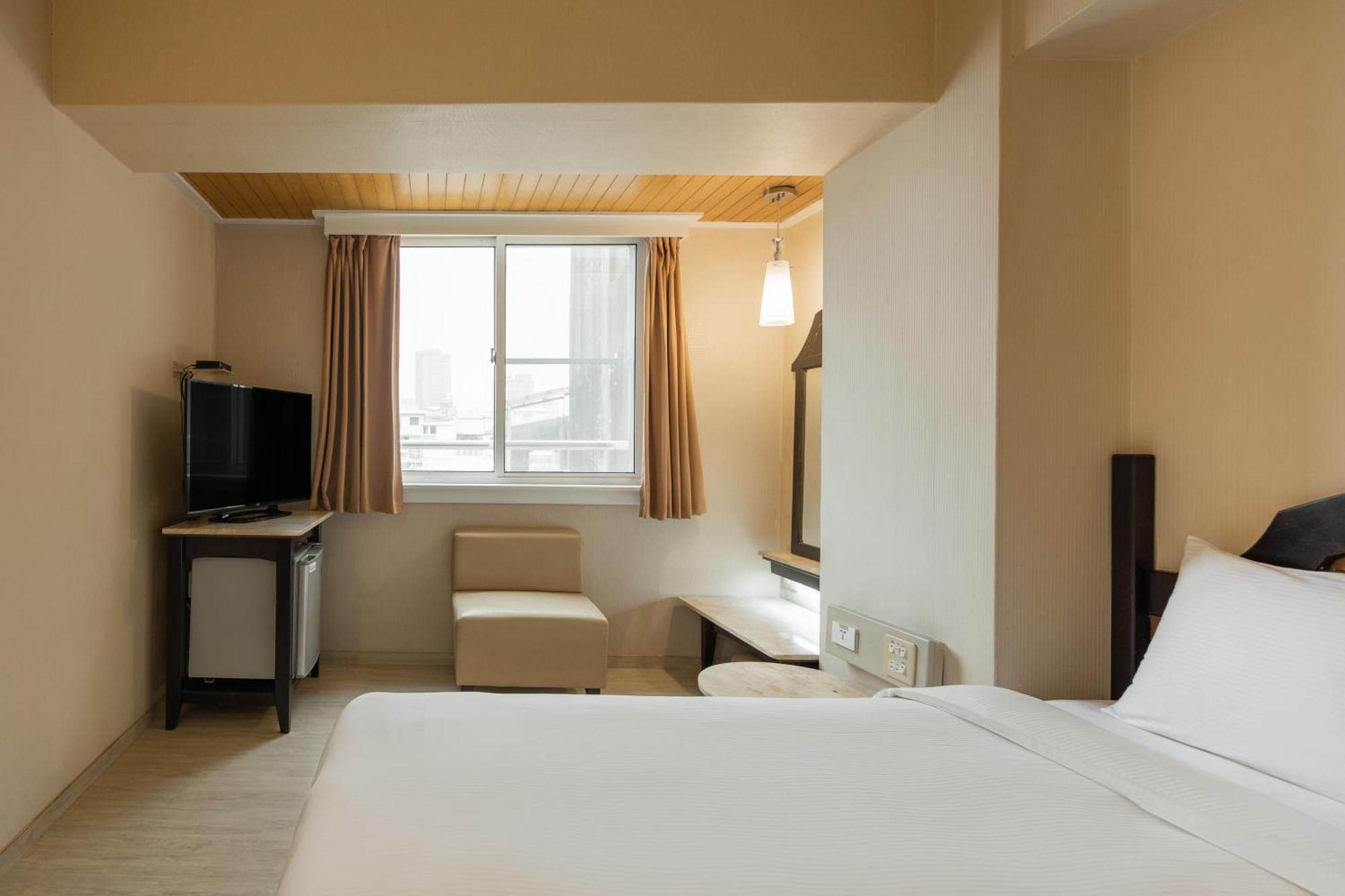 Kindness Hotel Weiwuying Kaohsiung Habitación foto