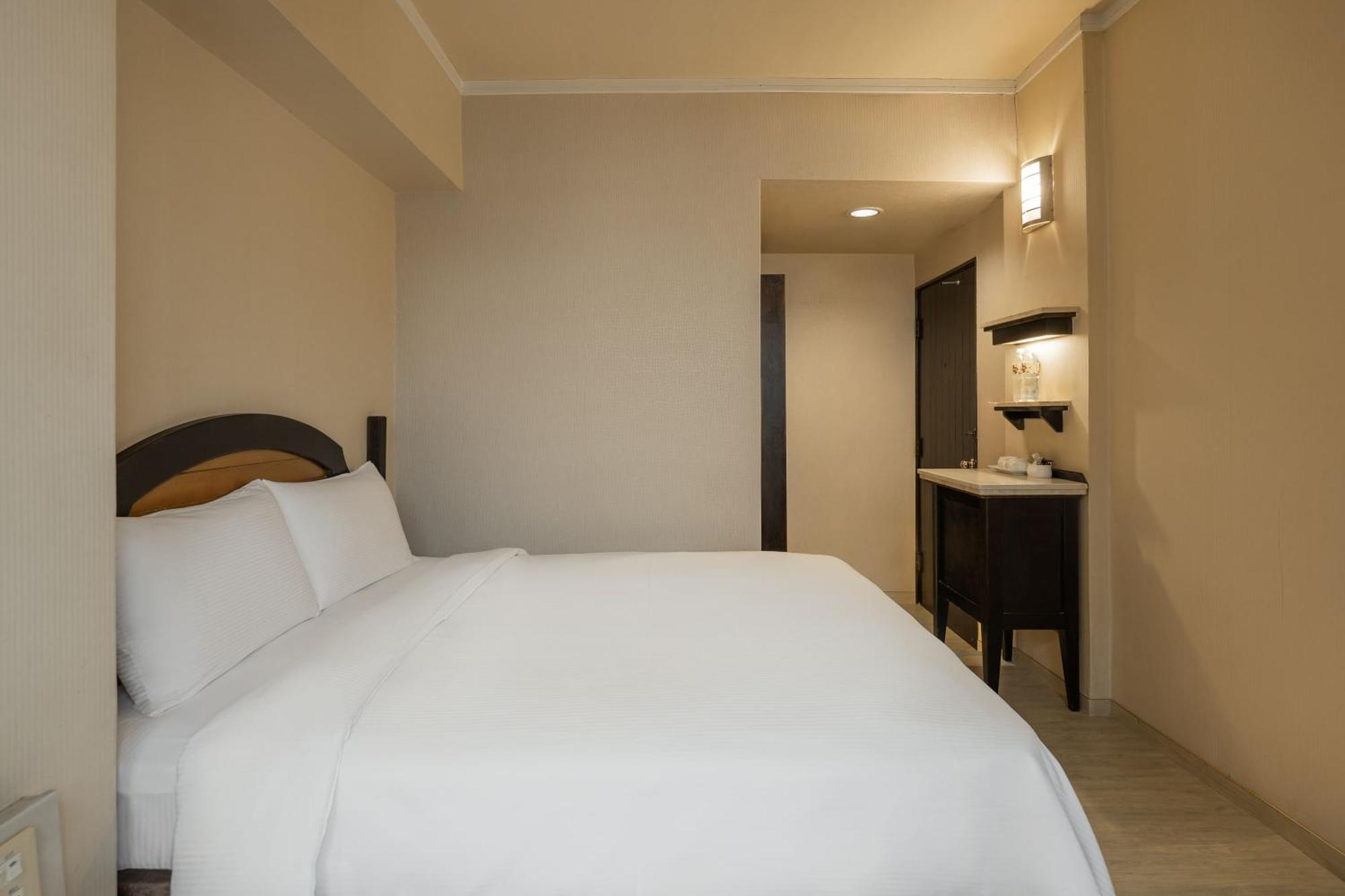 Kindness Hotel Weiwuying Kaohsiung Habitación foto