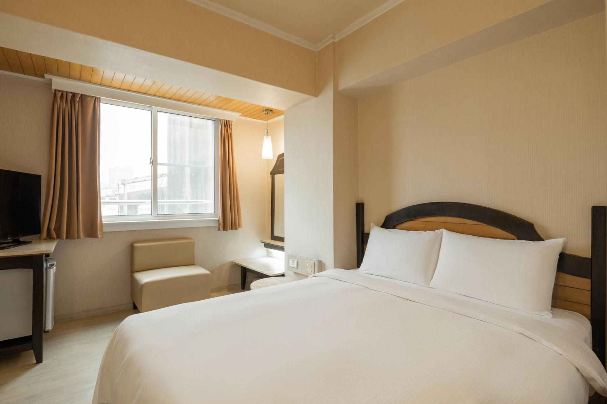 Kindness Hotel Weiwuying Kaohsiung Habitación foto